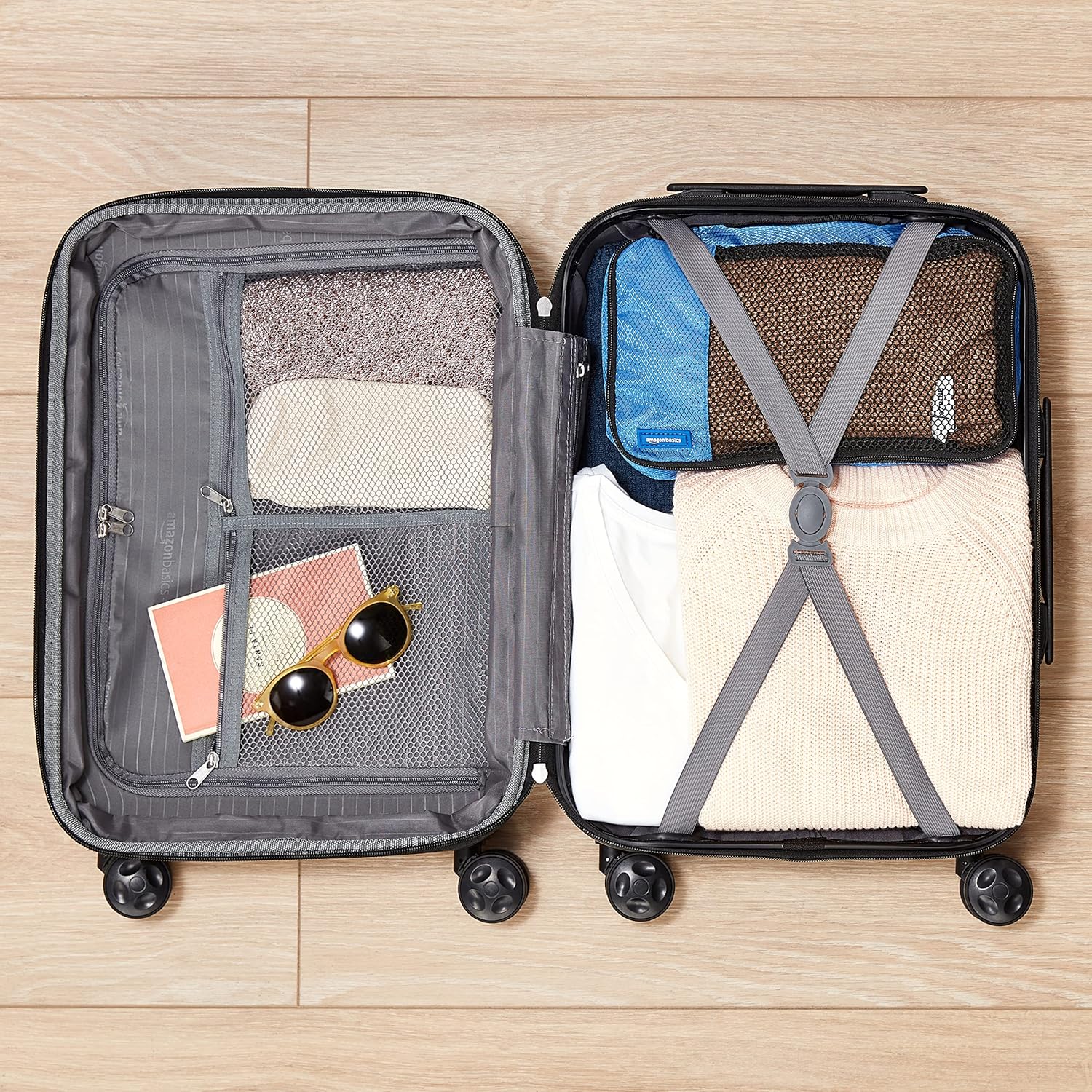 Amazon Basics Maleta de viaje rígidaa giratoria - 68 cm, Azul marino - 3