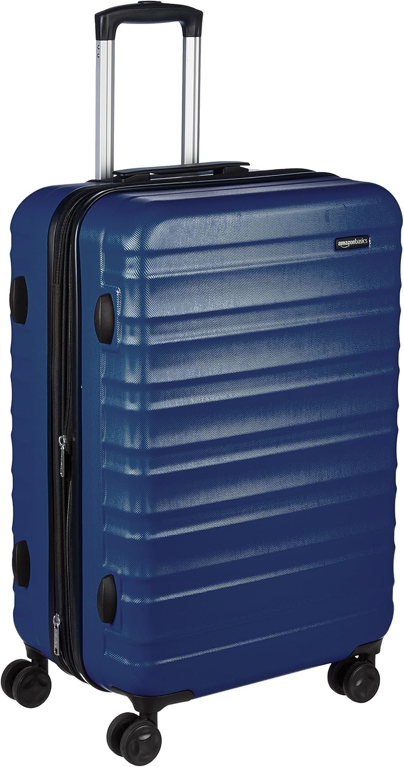 Amazon Basics Maleta de viaje rígidaa giratoria - 68 cm, Azul marino - 1